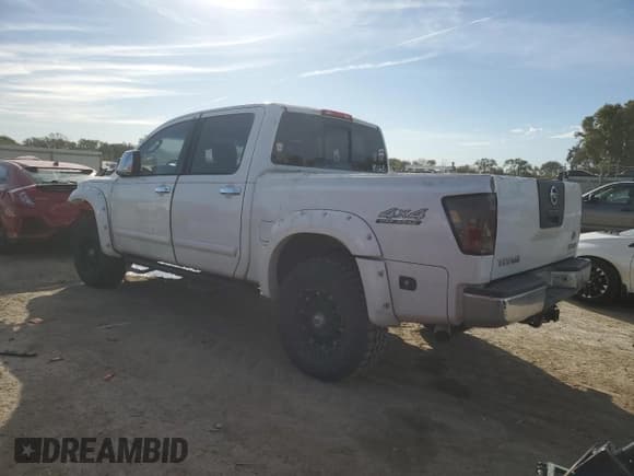 ✅ 2004 Nissan Titan SE • VIN: 1N6AA07B64N565786 • Lot: 82687485. Listed on Copart with 184,915 mi. Free auction sales archive from the USA and detailed vehicle history report at DreamBid. Image 2.