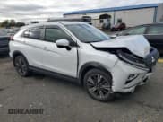 ✅ 2023 Mitsubishi Eclipse Cross SE • VIN: JA4ATWAA7PZ005928 • Lot: 86527485. Listed on Copart with 14,148 mi. Free auction sales archive from the USA and detailed vehicle history report at DreamBid. Image 4.