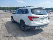 ✅ 2019 Honda Pilot Touring 8-Passenger • VIN: 5FNYF5H9XKB001842 • Lot: 43026784. Listed on IAAI with 114,674 mi. Free auction sales archive from the USA and detailed vehicle history report at DreamBid. Image 3.