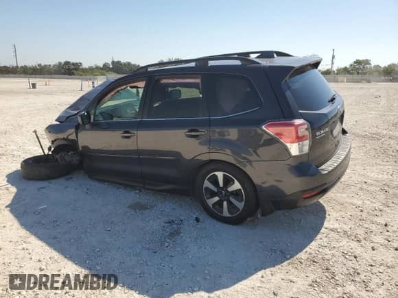 2017 Subaru Forester Limited with VIN JF2SJARC7HH419714, listed as a Copart auction lot 86193765 with 137,110 mi miles and Salvage title. Bid and sale history available at DreamBid. Image 2.