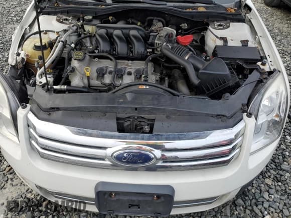 ✅ 2008 Ford Fusion SE • VIN: 3FAHP01118R196814 • Лот: 86227255. Опубликован ранее на Copart с пробегом 66 706 миль. Бесплатный доступ к архиву аукционных продаж из США и подробный отчёт об истории автомобиля на DreamBid. Изображение 11.