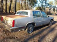 ✅ 1988 Cadillac DeVille • VIN: 1G6CD5155J4332134 • Lot: 43765272. Wystawiony na IAAI z przebiegiem 173 626 mil. Bezpłatny archiwum sprzedaży aukcyjnych z USA i szczegółowy raport historii pojazdu na DreamBid. Zdjęcie 14.