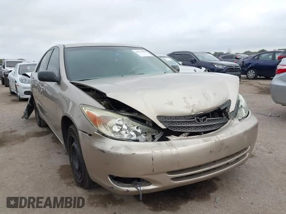✅ 2004 Toyota Camry LE • VIN: JTDBE32K640274741 • Лот: 43517408. Опубликован ранее на IAAI с пробегом 264 900 миль. Бесплатный доступ к архиву аукционных продаж из США и подробный отчёт об истории автомобиля на DreamBid. Изображение 1.