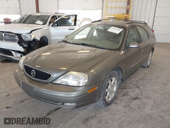 ✅ 2003 Mercury Sable LS Premium • VIN: 1MEHM59S73A620690 • Lot: 42740596. Listed on IAAI with 92,891 mi. Free auction sales archive from the USA and detailed vehicle history report at DreamBid. Image 2.