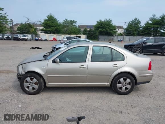 ✅ 2004 Volkswagen Jetta GLS • VIN: 3VWSE69MX4M060614 • Lot: 42389205. Listed on IAAI with 156,414 mi. Free auction sales archive from the USA and detailed vehicle history report at DreamBid. Image 14.