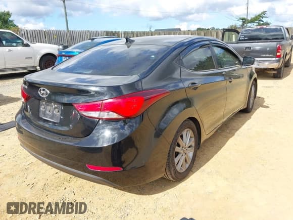 ✅ 2015 Hyundai Elantra SE • VIN: KMHDH4AE3FU261258 • Lot: 43357211. Listed on IAAI with 201,597 mi. Free auction sales archive from the USA and detailed vehicle history report at DreamBid. Image 4.