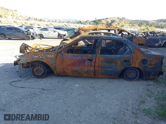 ✅ 1999 Toyota Corolla VE • VIN: 1NXBR12E4XZ178165 • Lot: 41367780. Listed on IAAI with Not provided. Free auction sales archive from the USA and detailed vehicle history report at DreamBid. Image 3.