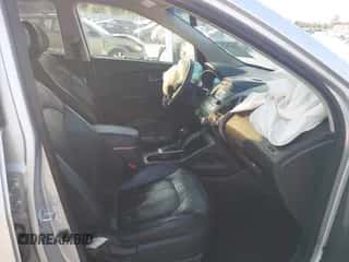 2014 Hyundai Tucson SE with VIN KM8JU3AG3EU901414, listed as a IAAI auction lot 43267845 with 141,471 mi miles and . Bid and sale history available at DreamBid. Image 5.