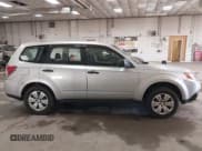 ✅ 2009 Subaru Forester X • VIN: JF2SH61649H772721 • Lot: 42572897. Listed on IAAI with 153,255 mi. Free auction sales archive from the USA and detailed vehicle history report at DreamBid. Image 14.