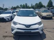 ✅ 2018 Toyota RAV4 XLE • VIN: 2T3WFREV1JW459553 • Lot: 42423474. Listed on IAAI with 129,523 mi. Free auction sales archive from the USA and detailed vehicle history report at DreamBid. Image 12.