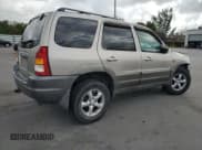 ✅ 2001 Mazda Tribute LX • VIN: 4F2CU08191KM64778 • Lot: 50755655. Listed on Copart with 114,161 mi. Free auction sales archive from the USA and detailed vehicle history report at DreamBid. Image 3.