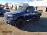 2012 Chevrolet Colorado Work Truck with VIN 1GCGTBFE3C8125018, listed as a Copart auction lot 90024745 with 156,864 mi miles and Salvage title. Bid and sale history available at DreamBid. Image 1.