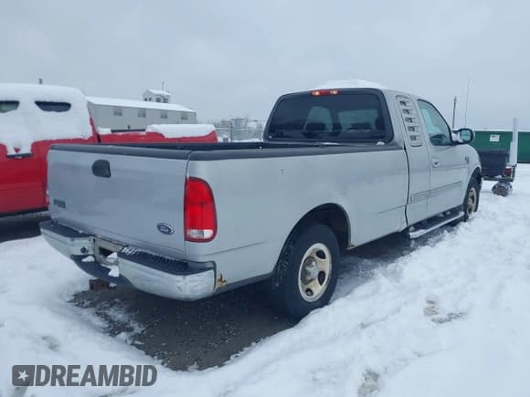 ✅ 2002 Ford F-150 XL • VIN: 1FTRX17W72NA98128 • Lot: 43835387. Listed on IAAI with 160,884 mi. Free auction sales archive from the USA and detailed vehicle history report at DreamBid. Image 4.