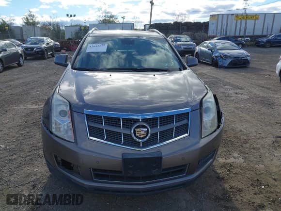 ✅ 2011 Cadillac SRX Luxury Collection • VIN: 3GYFNDEY7BS659832 • Lot: 43642277. Wystawiony na IAAI z przebiegiem 192 904 mil. Bezpłatny archiwum sprzedaży aukcyjnych z USA i szczegółowy raport historii pojazdu na DreamBid. Zdjęcie 11.