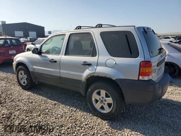 ✅ 2006 Ford Escape Hybrid • VIN: 1FMYU96H76KB49197 • Lot: 60895845. Wystawiony na Copart z przebiegiem 192 726 mil. Bezpłatny archiwum sprzedaży aukcyjnych z USA i szczegółowy raport historii pojazdu na DreamBid. Zdjęcie 2.