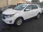 2018 Chevrolet Equinox LT z VIN 3GNAXJEV4JS576587, wystawiony jako IAAI lot #43061989 z przebiegiem 106 418 mil mil oraz . Historia ofert i sprzedaży dostępna na DreamBid. Obrazek 2.