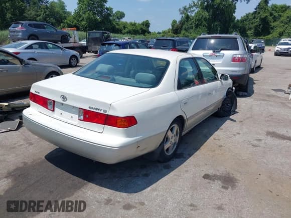 ✅ 2001 Toyota Camry CE • VIN: JT2BG22KX10546426 • Lot: 42812021. Listed on IAAI with 184,122 mi. Free auction sales archive from the USA and detailed vehicle history report at DreamBid. Image 4.