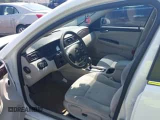 2014 Chevrolet Impala LS with VIN 2G1WA5E38E1175110, listed as a IAAI auction lot 42623881 with 125,150 mi miles and . Bid and sale history available at DreamBid. Image 5.