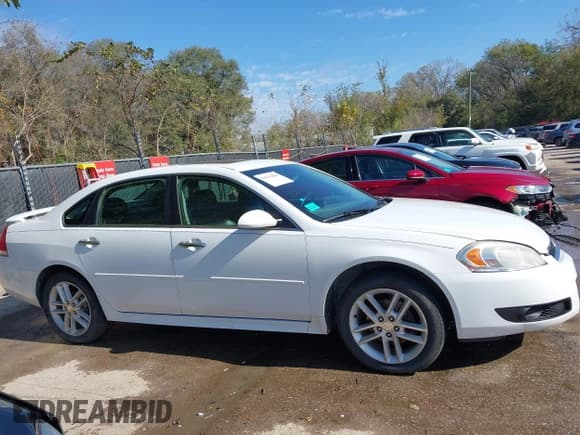 ✅ 2014 Chevrolet Impala LTZ • VIN: 2G1WC5E36E1130886 • Lot: 43533880. Wystawiony na IAAI z przebiegiem 200 445 mil. Bezpłatny archiwum sprzedaży aukcyjnych z USA i szczegółowy raport historii pojazdu na DreamBid. Zdjęcie 14.