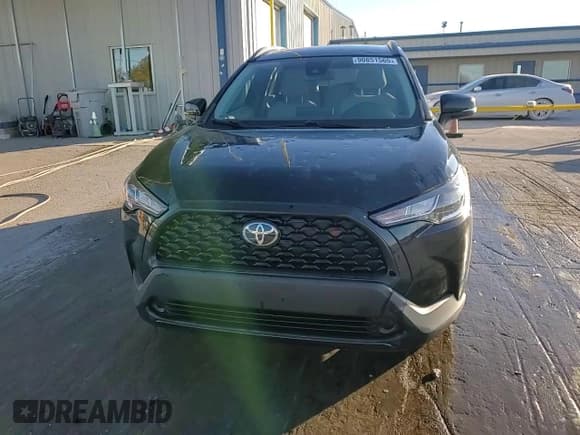 ✅ 2022 Toyota Corolla Cross LE • VIN: 7MUCAAAG5NV012215 • Lot: 90851565. Listed on Copart with 75,052 mi. Free auction sales archive from the USA and detailed vehicle history report at DreamBid. Image 14.