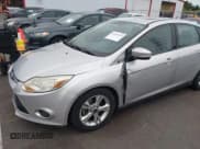 ✅ 2014 Ford Focus SE • VIN: 1FADP3F25EL312821 • Lot: 43557653. Listed on IAAI with 186,806 mi. Free auction sales archive from the USA and detailed vehicle history report at DreamBid. Image 2.