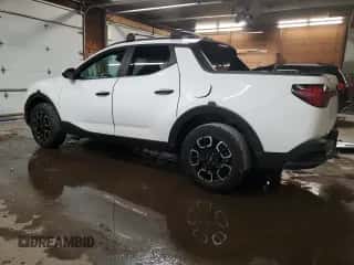 2022 Hyundai Santa Cruz SEL z VIN 5NTJCDAE5NH009205, wystawiony jako Copart lot #77241474 z przebiegiem 32 417 mil mil oraz Szkoda całkowita • Salvage title. Historia ofert i sprzedaży dostępna na DreamBid. Obrazek 2.