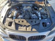 ✅ 2011 BMW 7 Series 750Li xDrive • VIN: WBAKC8C56BC433858 • Lot: 94308455. Wystawiony na Copart z przebiegiem 107 798 mil. Bezpłatny archiwum sprzedaży aukcyjnych z USA i szczegółowy raport historii pojazdu na DreamBid. Zdjęcie 11.