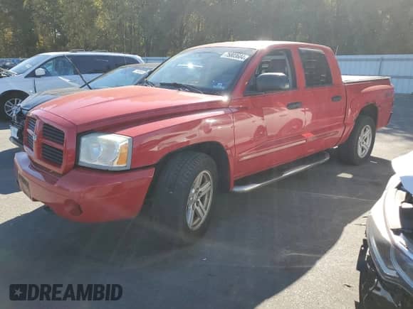 2007 Dodge Dakota SLT z VIN 1D7HW48N57S103881, wystawiony jako Copart lot #75803604 z przebiegiem 194 688 mil mil oraz Szkoda całkowita • Salvage title. Historia ofert i sprzedaży dostępna na DreamBid. Obrazek 1.