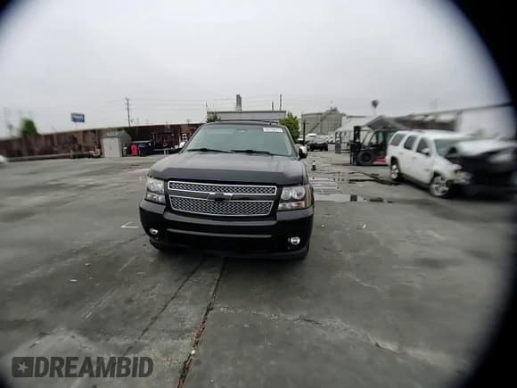 ✅ 2014 Chevrolet Tahoe LTZ • VIN: 1GNSCCE08ER156386 • Lot: 60736625. Listed on Copart with 207,510 mi. Free auction sales archive from the USA and detailed vehicle history report at DreamBid. Image 14.