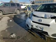 ✅ 2014 Scion iQ • VIN: JTNJJXB01EJ026837 • Lot: 43596385. Wystawiony na Copart z przebiegiem 52 826 mil. Bezpłatny archiwum sprzedaży aukcyjnych z USA i szczegółowy raport historii pojazdu na DreamBid. Zdjęcie 12.