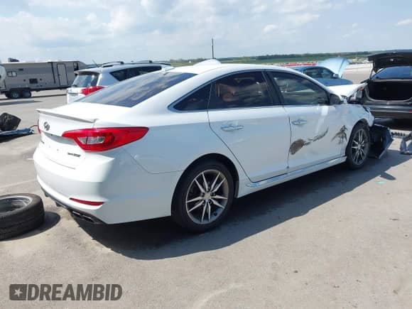2015 Hyundai Sonata Sport z VIN 5NPE34AB3FH092236, wystawiony jako IAAI lot #43083552 z przebiegiem 89 391 mil mil oraz . Historia ofert i sprzedaży dostępna na DreamBid. Obrazek 4.
