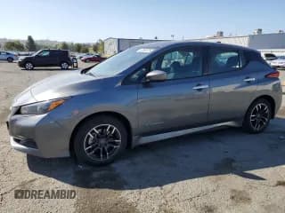 ✅ 2018 Nissan LEAF S • VIN: 1N4AZ1CPXJC311952 • Лот: 57066725. Опубликован ранее на Copart с пробегом 133 498 миль. Бесплатный доступ к архиву аукционных продаж из США и подробный отчёт об истории автомобиля на DreamBid. Изображение 1.