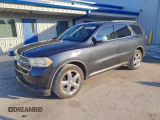 ✅ 2013 Dodge Durango Citadel • VIN: 1C4RDJEG1DC687999 • Lot: 96984105. Listed on Copart with 150,156 mi. Free auction sales archive from the USA and detailed vehicle history report at DreamBid. Image 1.