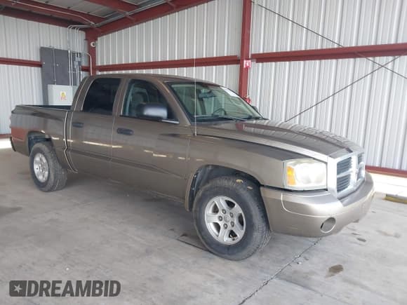 ✅ 2007 Dodge Dakota SLT • VIN: 1D7HE48N17S144088 • Лот: 40577462. Опубликован ранее на IAAI с пробегом 192 502 миль. Бесплатный доступ к архиву аукционных продаж из США и подробный отчёт об истории автомобиля на DreamBid. Изображение 1.
