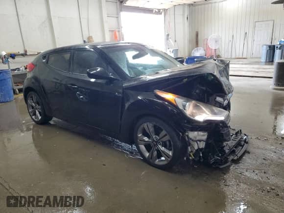 2014 Hyundai Veloster z VIN KMHTC6AD2EU208868, wystawiony jako Copart lot #65717864 z przebiegiem 150 225 mil mil oraz Szkoda całkowita • Salvage title. Historia ofert i sprzedaży dostępna na DreamBid. Obrazek 4.