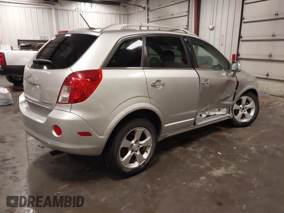 ✅ 2014 Chevrolet Captiva Sport LT • VIN: 3GNAL3EK5ES608871 • Lot: 42516982. Wystawiony na IAAI z przebiegiem 107 519 mil. Bezpłatny archiwum sprzedaży aukcyjnych z USA i szczegółowy raport historii pojazdu na DreamBid. Zdjęcie 4.