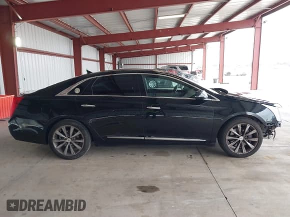 ✅ 2013 Cadillac XTS Livery • VIN: 2G61W5S33D9164395 • Lot: 41793791. Listed on IAAI with 421,499 mi. Free auction sales archive from the USA and detailed vehicle history report at DreamBid. Image 13.