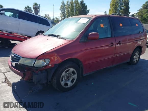 ✅ 2004 Honda Odyssey EX-L • VIN: 5FNRL18044B062243 • Лот: 43161084. Опубликован ранее на IAAI с пробегом 160 964 миль. Бесплатный доступ к архиву аукционных продаж из США и подробный отчёт об истории автомобиля на DreamBid. Изображение 2.