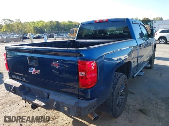 ✅ 2015 Chevrolet Silverado 1500 LT • VIN: 1GCUKREC8FF200715 • Lot: 42000192. Listed on IAAI with 133,254 mi. Free auction sales archive from the USA and detailed vehicle history report at DreamBid. Image 4.
