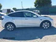 ✅ 2023 Tesla Model Y Long Range • VIN: 7SAYGDEEXPA149053 • Lot: 43063456. Wystawiony na IAAI z przebiegiem 22 748 mil. Bezpłatny archiwum sprzedaży aukcyjnych z USA i szczegółowy raport historii pojazdu na DreamBid. Zdjęcie 13.