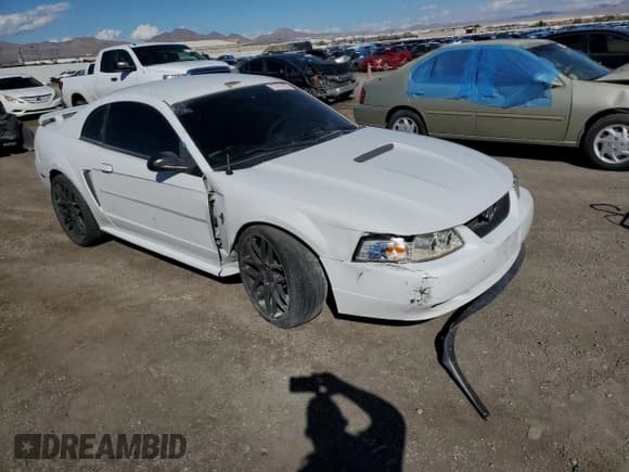 ✅ 2002 Ford Mustang Standard • VIN: 1FAFP40402F190145 • Lot: 70791935. Listed on Copart with Not provided. Free auction sales archive from the USA and detailed vehicle history report at DreamBid. Image 4.