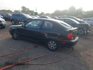 2005 Hyundai Accent GLS z VIN KMHCG35CX5U332441, wystawiony jako IAAI lot #43217479 z przebiegiem 225 254 mil mil oraz . Historia ofert i sprzedaży dostępna na DreamBid. Obrazek 3.