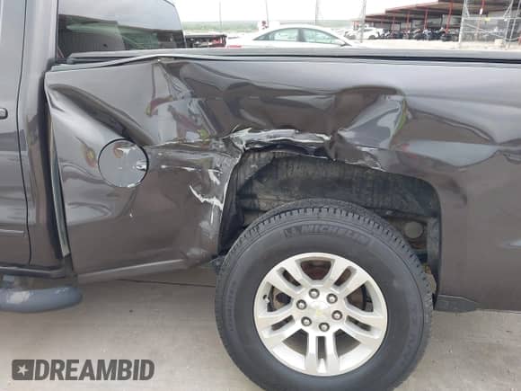 2015 Chevrolet Silverado 1500 LT z VIN 3GCUKRECXFG183351, wystawiony jako IAAI lot #42650034 z przebiegiem 130 129 mil mil oraz . Historia ofert i sprzedaży dostępna na DreamBid. Obrazek 6.