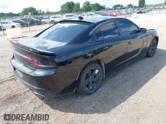 ✅ 2016 Dodge Charger SXT • VIN: 2C3CDXHG6GH214254 • Lot: 43043044. Listed on IAAI with 152,185 mi. Free auction sales archive from the USA and detailed vehicle history report at DreamBid. Image 4.