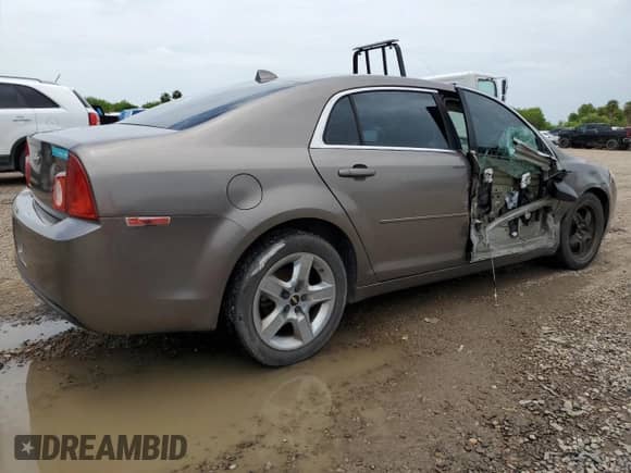 2012 Chevrolet Malibu 1LS z VIN 1G1ZB5E08CF189059, wystawiony jako Copart lot #64994054 z przebiegiem 144 789 mil mil oraz Szkoda całkowita • Salvage title. Historia ofert i sprzedaży dostępna na DreamBid. Obrazek 3.