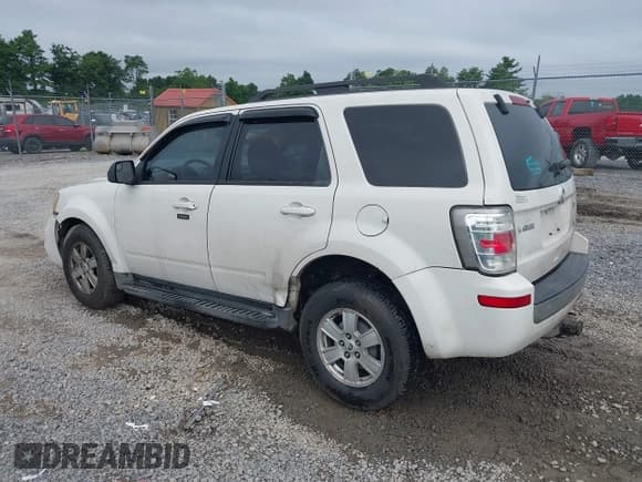 ✅ 2010 Mercury Mariner • VIN: 4M2CN8BG3AKJ22391 • Lot: 39988241. Listed on IAAI with 218,423 mi. Free auction sales archive from the USA and detailed vehicle history report at DreamBid. Image 3.