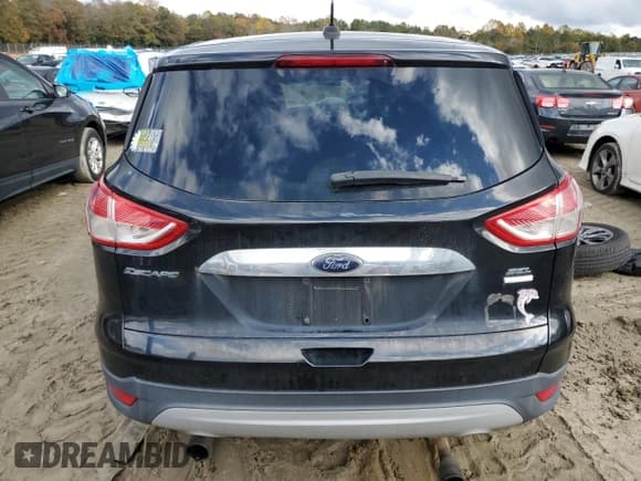 ✅ 2013 Ford Escape SEL • VIN: 1FMCU9H9XDUA79437 • Lot: 90723285. Wystawiony na Copart z przebiegiem Nie podano. Bezpłatny archiwum sprzedaży aukcyjnych z USA i szczegółowy raport historii pojazdu na DreamBid. Zdjęcie 6.