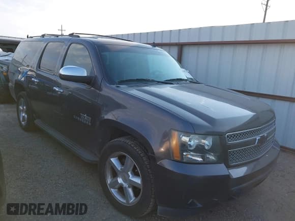 ✅ 2011 Chevrolet Suburban LT • VIN: 1GNSCJE00BR203099 • Lot: 43037408. Listed on IAAI with 238,741 mi. Free auction sales archive from the USA and detailed vehicle history report at DreamBid. Image 1.