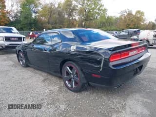 ✅ 2013 Dodge Challenger SXT • VIN: 2C3CDYAG2DH724886 • Lot: 43515778. Listed on IAAI with 104,828 mi. Free auction sales archive from the USA and detailed vehicle history report at DreamBid. Image 3.