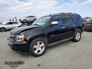 2007 Chevrolet Tahoe LTZ with VIN 1GNFC13J87R394792, listed as a Copart auction lot 85131395 with 191,795 mi miles and Salvage title. Bid and sale history available at DreamBid. Image 1.
